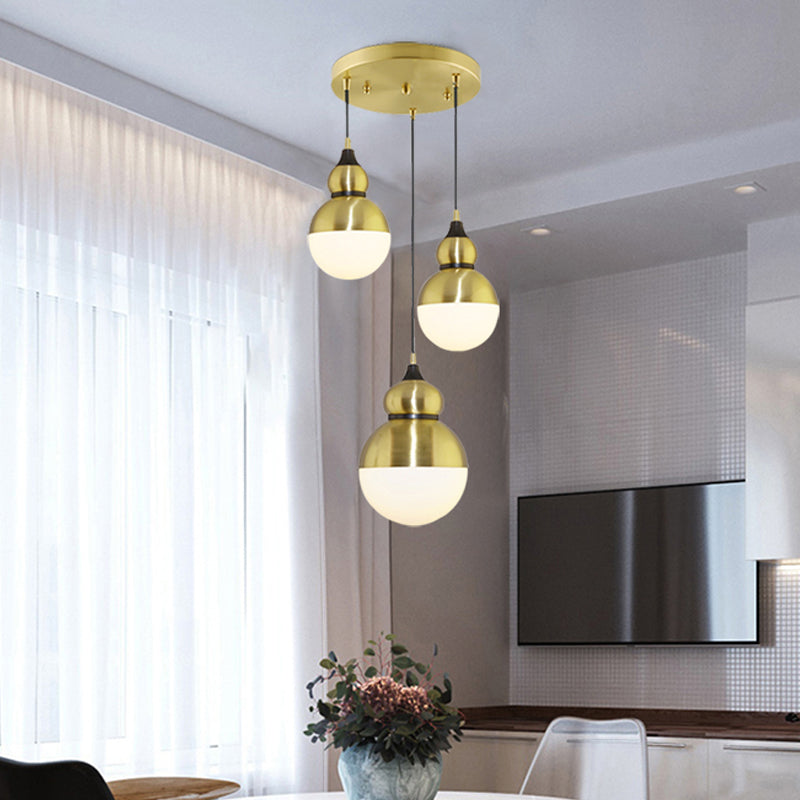 Gourd Dinette Multi-Light Pendant Cream Matte Glass 3 Bulbs Modernism Hanging Light in Brass Clearhalo 'Ceiling Lights' 'Glass shade' 'Glass' 'Modern Pendants' 'Modern' 'Pendant Lights' 'Pendants' Lighting' 1457594