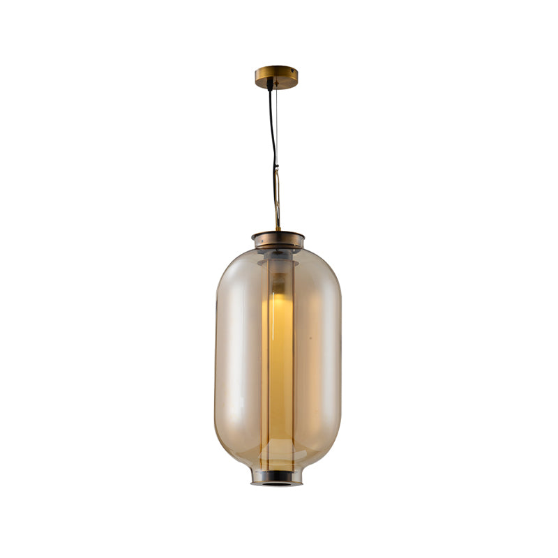 12.5"/19" H Gold Single Pendulum Light Retro Amber Glass Sphere/Ellipse/Oblong Suspension Lamp with Tube Frame Insert Clearhalo 'Ceiling Lights' 'Glass shade' 'Glass' 'Industrial Pendants' 'Industrial' 'Middle Century Pendants' 'Pendant Lights' 'Pendants' 'Tiffany' Lighting' 1457907