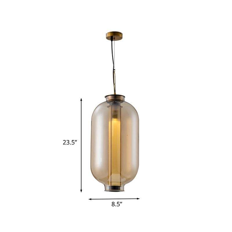 12.5"/19" H Gold Single Pendulum Light Retro Amber Glass Sphere/Ellipse/Oblong Suspension Lamp with Tube Frame Insert Clearhalo 'Ceiling Lights' 'Glass shade' 'Glass' 'Industrial Pendants' 'Industrial' 'Middle Century Pendants' 'Pendant Lights' 'Pendants' 'Tiffany' Lighting' 1457908