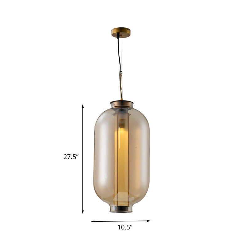 12.5"/19" H Gold Single Pendulum Light Retro Amber Glass Sphere/Ellipse/Oblong Suspension Lamp with Tube Frame Insert Clearhalo 'Ceiling Lights' 'Glass shade' 'Glass' 'Industrial Pendants' 'Industrial' 'Middle Century Pendants' 'Pendant Lights' 'Pendants' 'Tiffany' Lighting' 1457909