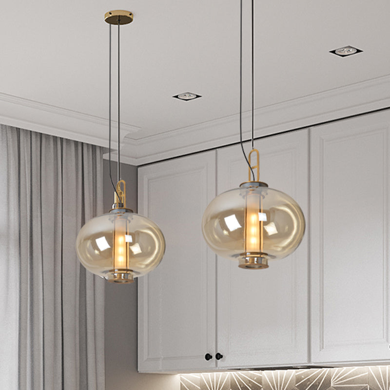 12.5"/19" H Gold Single Pendulum Light Retro Amber Glass Sphere/Ellipse/Oblong Suspension Lamp with Tube Frame Insert Clearhalo 'Ceiling Lights' 'Glass shade' 'Glass' 'Industrial Pendants' 'Industrial' 'Middle Century Pendants' 'Pendant Lights' 'Pendants' 'Tiffany' Lighting' 1457911