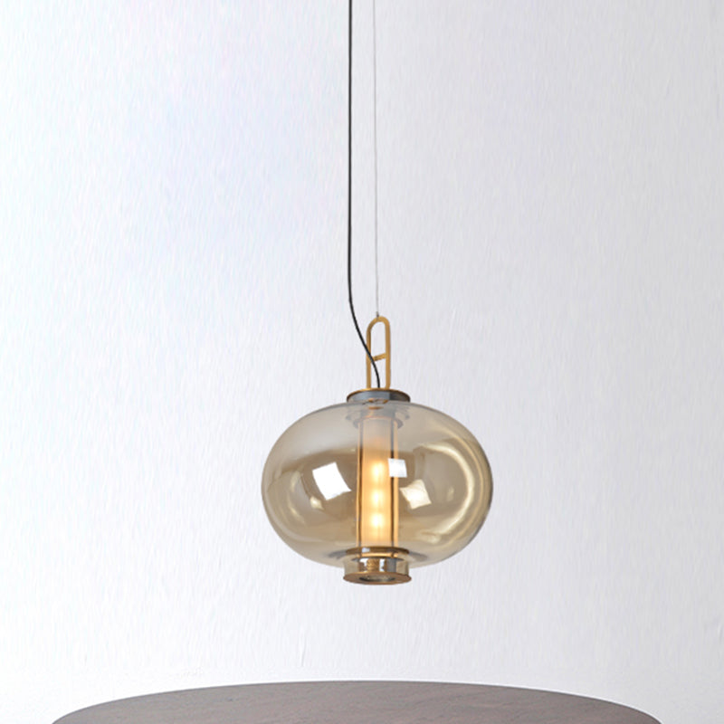 12.5"/19" H Gold Single Pendulum Light Retro Amber Glass Sphere/Ellipse/Oblong Suspension Lamp with Tube Frame Insert Clearhalo 'Ceiling Lights' 'Glass shade' 'Glass' 'Industrial Pendants' 'Industrial' 'Middle Century Pendants' 'Pendant Lights' 'Pendants' 'Tiffany' Lighting' 1457912