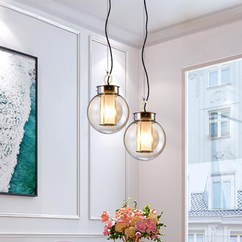 12.5"/19" H Gold Single Pendulum Light Retro Amber Glass Sphere/Ellipse/Oblong Suspension Lamp with Tube Frame Insert Clearhalo 'Ceiling Lights' 'Glass shade' 'Glass' 'Industrial Pendants' 'Industrial' 'Middle Century Pendants' 'Pendant Lights' 'Pendants' 'Tiffany' Lighting' 1457917