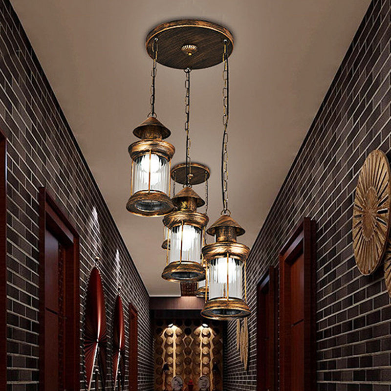 Coastal Kerosene Multi Ceiling Light 3-Head Metallic Pendant Lamp in Brass with Clear Ribbed Glass Shade Clearhalo 'Art Deco Pendants' 'Cast Iron' 'Ceiling Lights' 'Ceramic' 'Crystal' 'Industrial Pendants' 'Industrial' 'Metal' 'Middle Century Pendants' 'Pendant Lights' 'Pendants' 'Tiffany' Lighting' 1472986