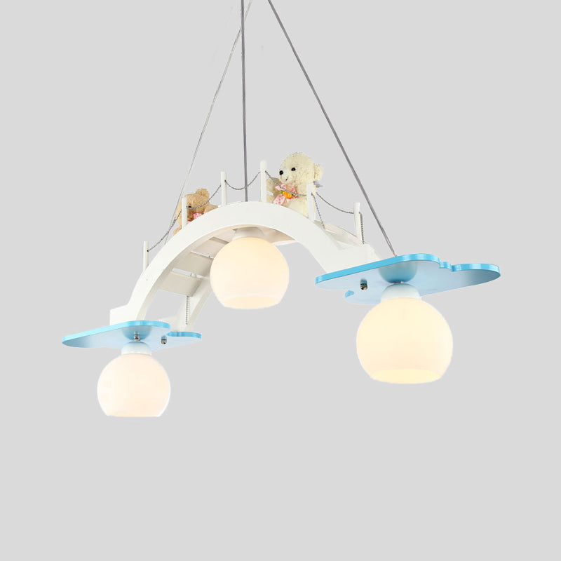 Bridge Nursery Cluster Pendant Lamp Wooden 3 Heads Kids Suspension Light in Blue/Pink with Cream Glass Shade Clearhalo 'Ceiling Lights' 'Glass shade' 'Glass' 'Pendant Lights' 'Pendants' Lighting' 1473533