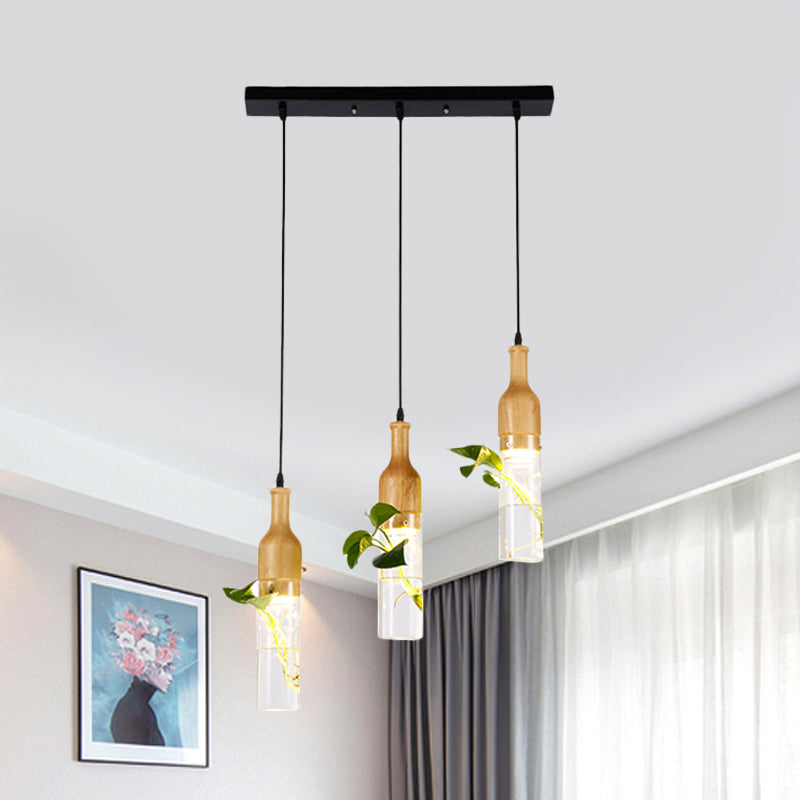Bottle Restaurant Multi Light Pendant Art Deco Clear Glass 3 Heads Wood Hanging Lamp with Round/Linear Canopy Wood Linear Clearhalo 'Ceiling Lights' 'Chandeliers' 'Glass shade' 'Glass' 'Pendant Lights' 'Pendants' Lighting' 1473903