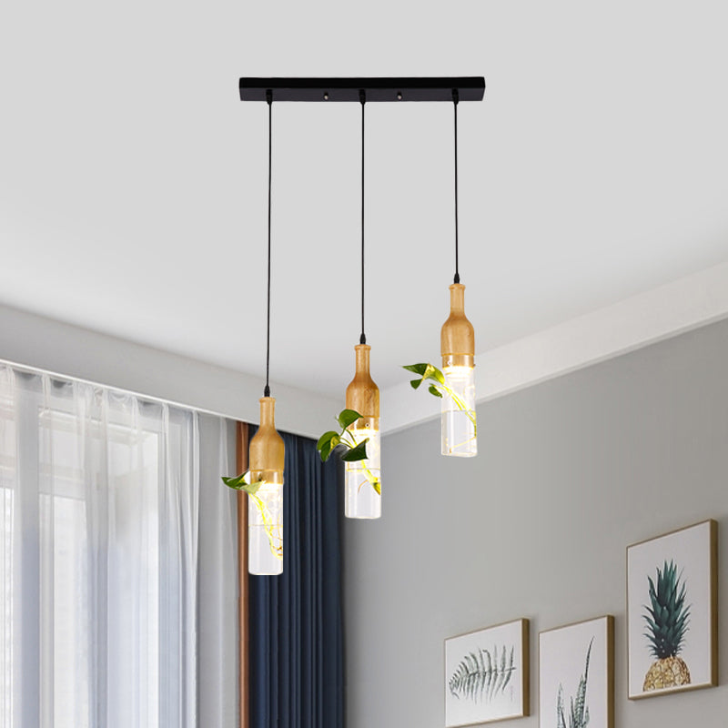 Bottle Restaurant Multi Light Pendant Art Deco Clear Glass 3 Heads Wood Hanging Lamp with Round/Linear Canopy Clearhalo 'Ceiling Lights' 'Chandeliers' 'Glass shade' 'Glass' 'Pendant Lights' 'Pendants' Lighting' 1473904