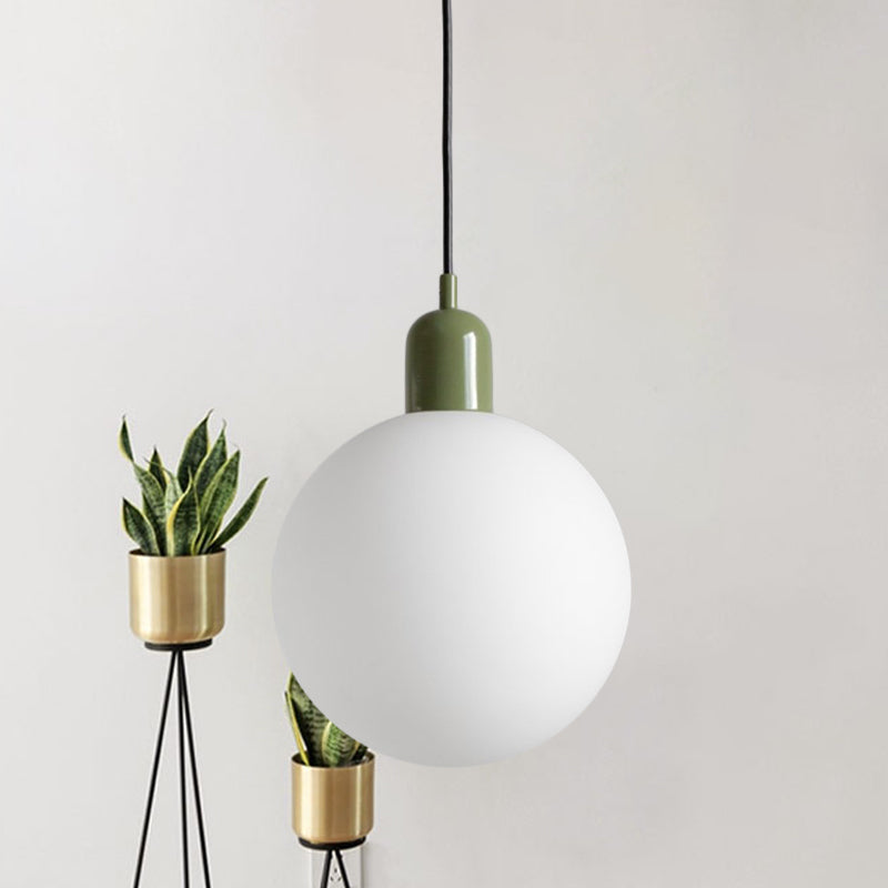 Simple Spherical Opal Glass Drop Pendant 1-Light Hanging Ceiling Light with Red/White/Green Cap Clearhalo 'Ceiling Lights' 'Glass shade' 'Glass' 'Modern Pendants' 'Modern' 'Pendant Lights' 'Pendants' Lighting' 1475207