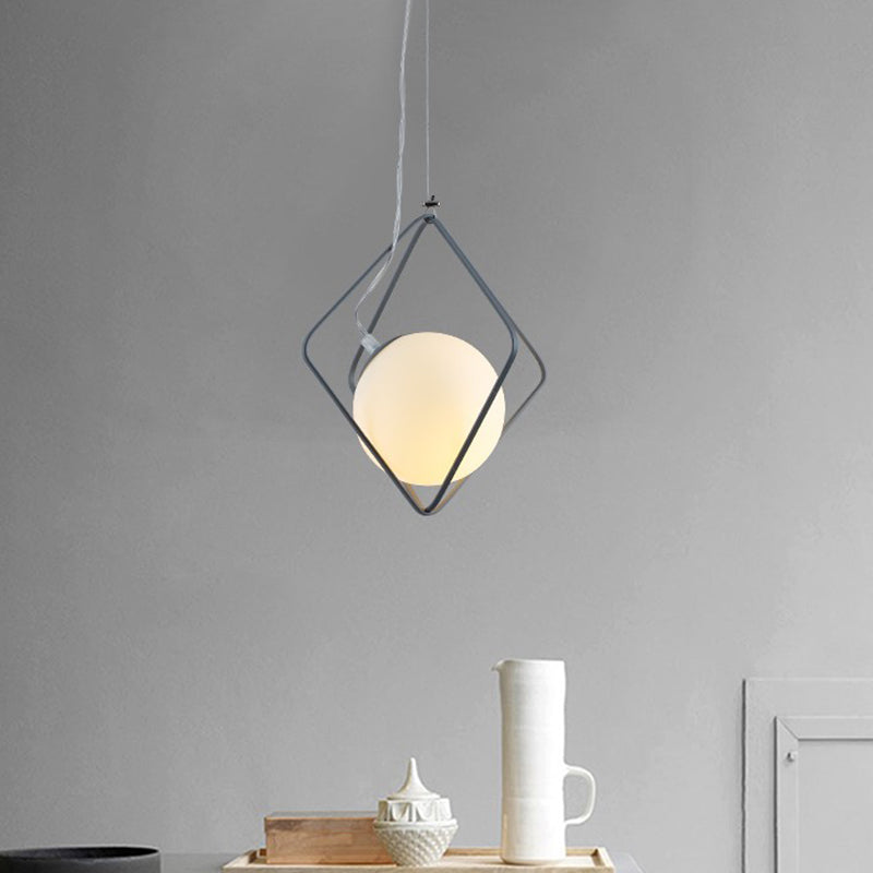 Green/Grey Rhombus Cage Pendant Light Minimalist 1 Head Iron Hanging Lamp Kit with Ball Milk Glass Shade Inside Grey Clearhalo 'Ceiling Lights' 'Close To Ceiling Lights' 'Glass shade' 'Glass' 'Modern Pendants' 'Modern' 'Pendant Lights' 'Pendants' Lighting' 1475220