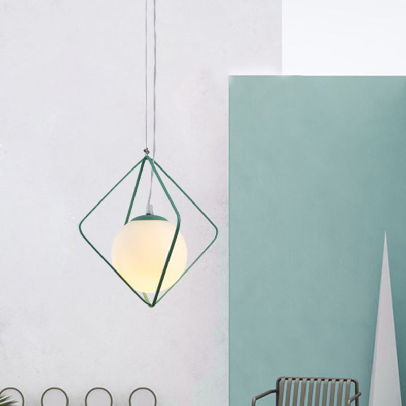 Green/Grey Rhombus Cage Pendant Light Minimalist 1 Head Iron Hanging Lamp Kit with Ball Milk Glass Shade Inside Clearhalo 'Ceiling Lights' 'Close To Ceiling Lights' 'Glass shade' 'Glass' 'Modern Pendants' 'Modern' 'Pendant Lights' 'Pendants' Lighting' 1475224