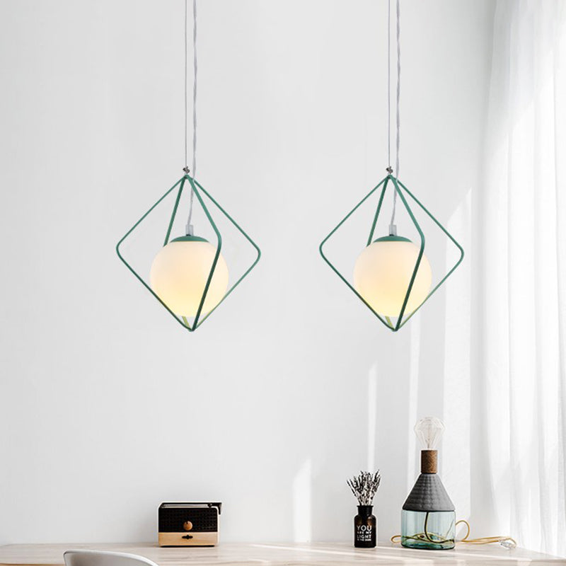 Green/Grey Rhombus Cage Pendant Light Minimalist 1 Head Iron Hanging Lamp Kit with Ball Milk Glass Shade Inside Green Clearhalo 'Ceiling Lights' 'Close To Ceiling Lights' 'Glass shade' 'Glass' 'Modern Pendants' 'Modern' 'Pendant Lights' 'Pendants' Lighting' 1475225