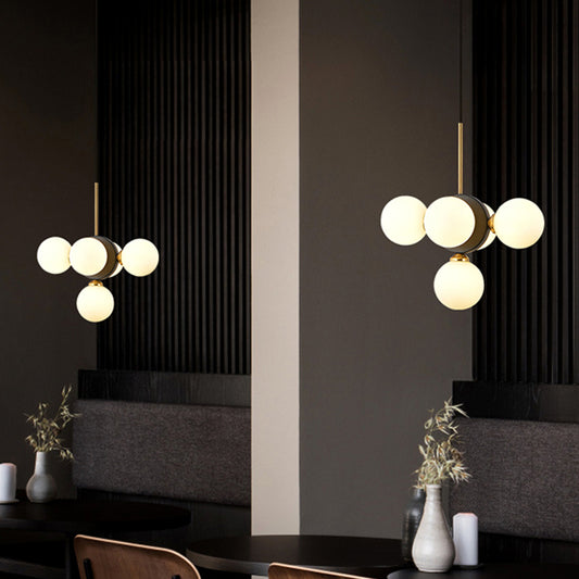 Orbs Restaurant Chandelier Pendant White/Amber Glass 5 Lights Mid Century Ceiling Suspension Lamp with Burst Design White Clearhalo 'Ceiling Lights' 'Chandeliers' 'Glass shade' 'Glass' 'Modern Chandeliers' 'Modern' Lighting' 1476016