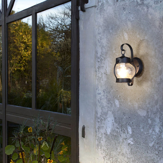 One Bulb Wall Light with Cylinder/Lantern Shade Bubble Glass Industrial Porch Sconce Lighting Fixture in Black Black Lantern Clearhalo 'Art deco wall lights' 'Cast Iron' 'Glass' 'Industrial wall lights' 'Industrial' 'Middle century wall lights' 'Modern' 'Rustic wall lights' 'Tiffany' 'Traditional wall lights' 'Wall Lamps & Sconces' 'Wall Lights' Lighting' 150213