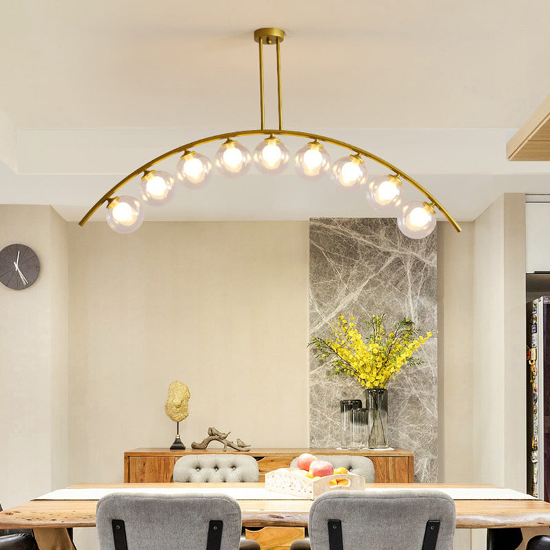 Postmodern 3/5/7-Light Island Pendant with Clear/White Shade Gold Curvy Ceiling Light for Kitchen 9 Clear Clearhalo 'Ceiling Lights' 'Close To Ceiling Lights' 'Glass shade' 'Glass' 'Island Lights' Lighting' 151329