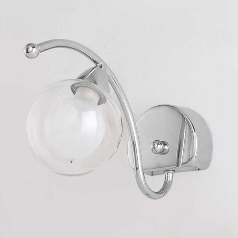Modern Globe Wall Lamp Clear Glass 1 Light Bedroom Led Wall Light Sconce in Chrome with Curved Arm Clearhalo 'Cast Iron' 'Glass' 'Industrial' 'Modern wall lights' 'Modern' 'Tiffany' 'Traditional wall lights' 'Wall Lamps & Sconces' 'Wall Lights' Lighting' 1523257