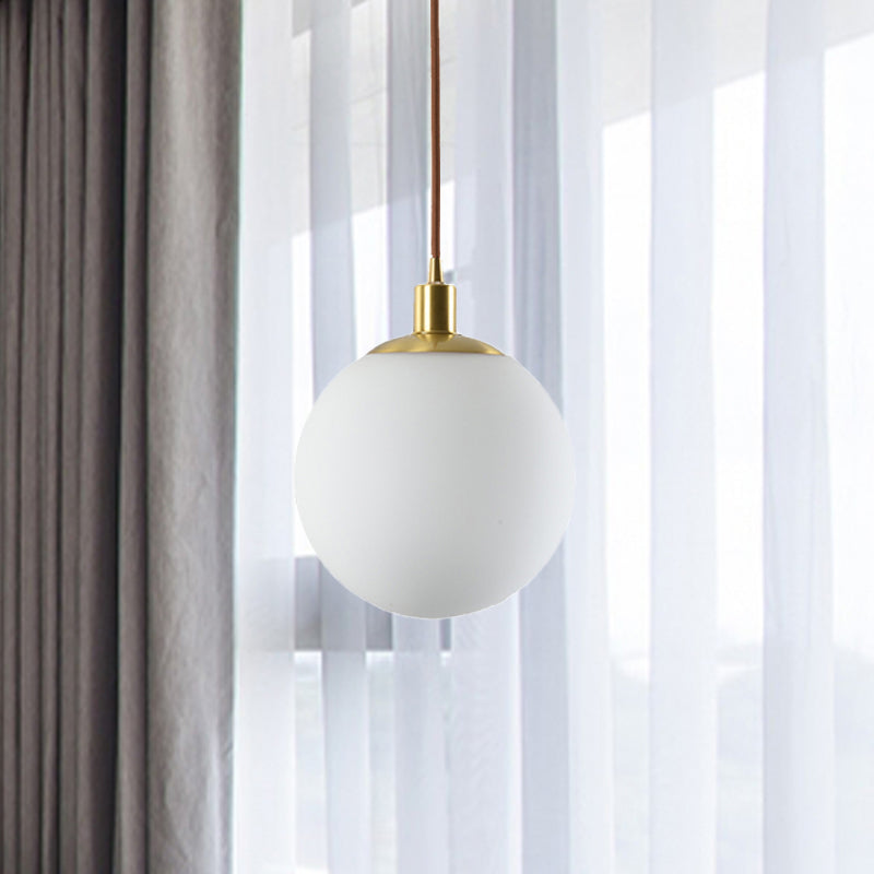 6"/8"/10" Wide Milky Glass Ball Pendant Light Post Modern Led Hanging Ceiling Lamp in Brass Clearhalo 'Ceiling Lights' 'Glass shade' 'Glass' 'Modern Pendants' 'Modern' 'Pendant Lights' 'Pendants' Lighting' 1523291