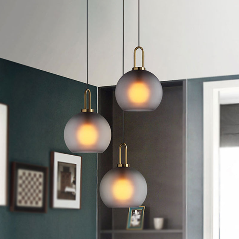 1 Light Living Room Pendant Lamp with Globe Clear/Smoky Glass Shade Modern Brass Hanging Lamp Kit, 8"/10"/12" Wide Clearhalo 'Ceiling Lights' 'Glass shade' 'Glass' 'Modern Pendants' 'Modern' 'Pendant Lights' 'Pendants' Lighting' 1523686