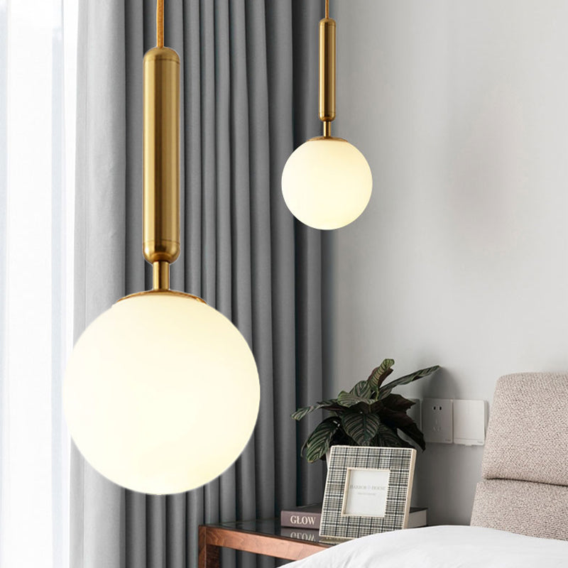 Spherical White Glass Suspension Pendant Modernist 1 Light 6"/8"/10" Wide Black/Gold Hanging Light Fixture Gold Clearhalo 'Ceiling Lights' 'Glass shade' 'Glass' 'Island Lights' 'Modern Pendants' 'Modern' 'Pendant Lights' 'Pendants' Lighting' 1523695