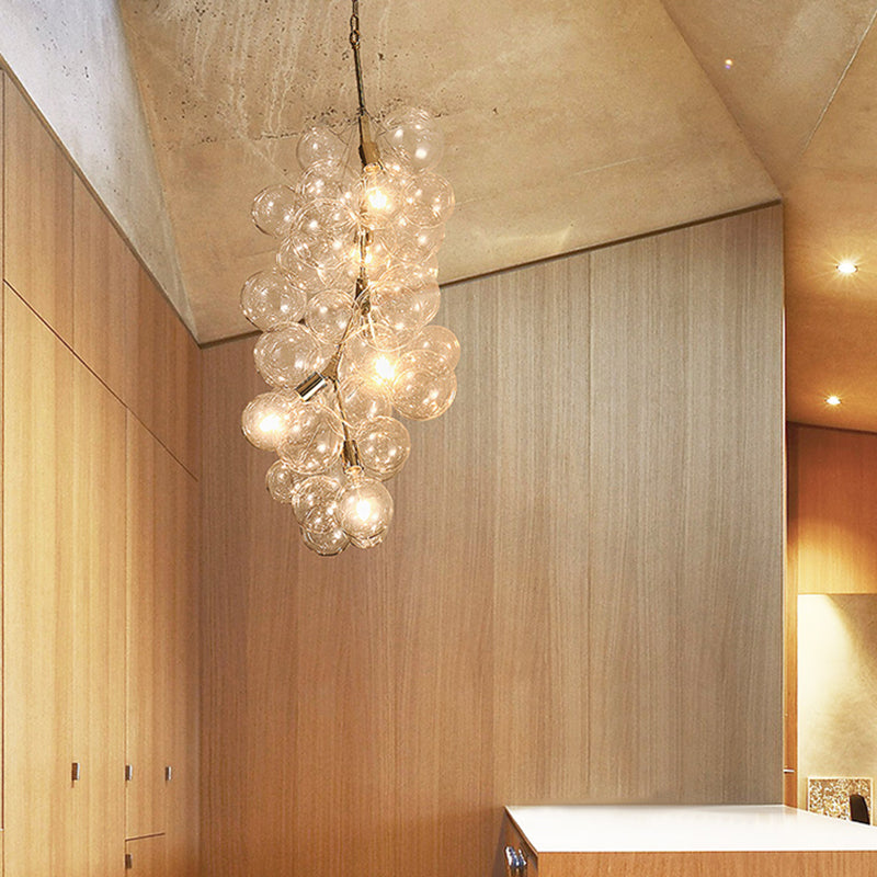 Modern Ball Hanging Ceiling Lamp Clear Glass 3/5-Light Living Room Chandelier Pendant in Gold Clearhalo 'Ceiling Lights' 'Chandeliers' 'Glass shade' 'Glass' 'Modern Chandeliers' 'Modern' Lighting' 155547