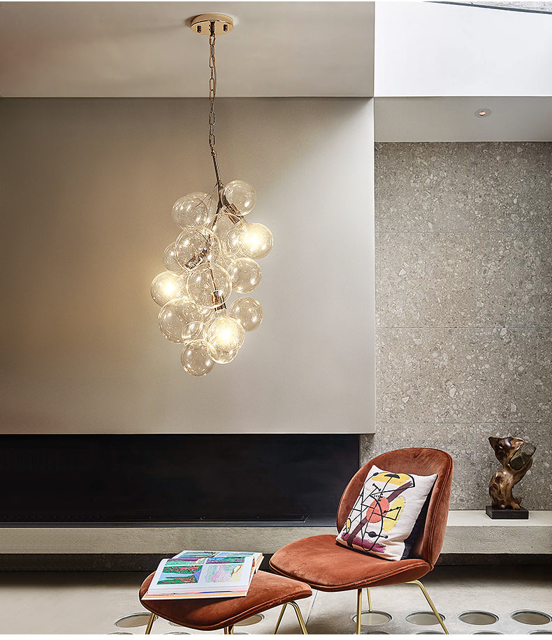 Modern Ball Hanging Ceiling Lamp Clear Glass 3/5-Light Living Room Chandelier Pendant in Gold 3 Gold Clearhalo 'Ceiling Lights' 'Chandeliers' 'Glass shade' 'Glass' 'Modern Chandeliers' 'Modern' Lighting' 155550