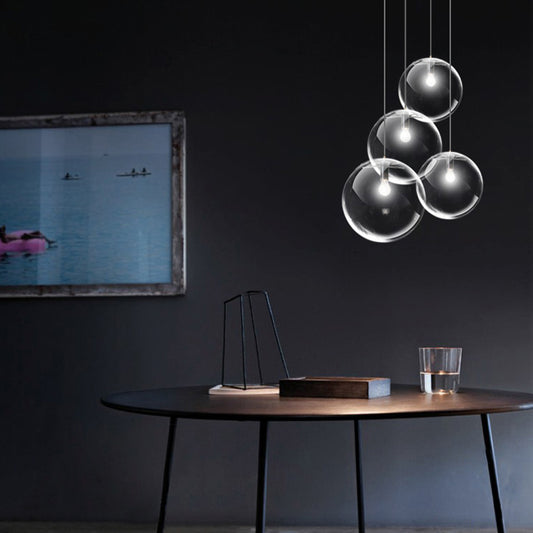 6"/8"/12" Wide Orb Pendant Lighting Contemporary 1 Light Clear Glass Hanging Ceiling Light in Black for Living Room Clear Clearhalo 'Ceiling Lights' 'Glass shade' 'Glass' 'Industrial Pendants' 'Industrial' 'Middle Century Pendants' 'Pendant Lights' 'Pendants' 'Tiffany' Lighting' 155765