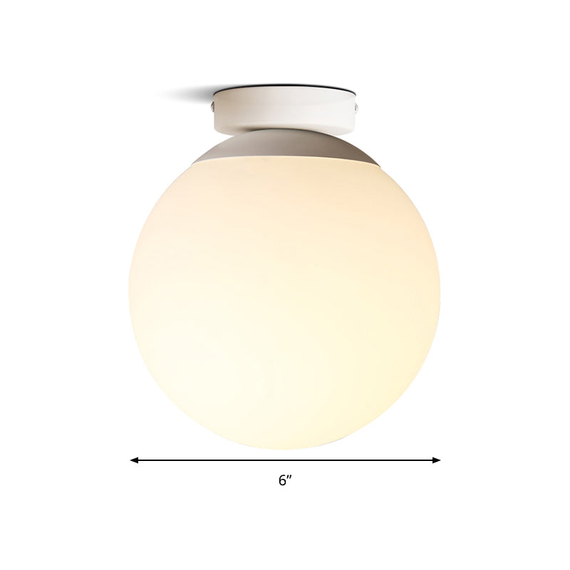 Opal Glass Globe Flush Mount Lamp Modern 1 Light 6"/8"/10" Wide White Flush Ceiling Light Fixture Clearhalo 'Ceiling Lights' 'Close To Ceiling Lights' 'Close to ceiling' 'Flush mount' Lighting' 157684