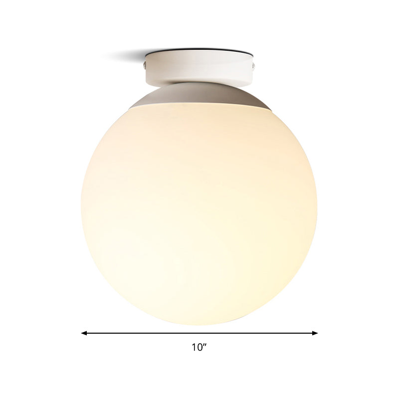 Opal Glass Globe Flush Mount Lamp Modern 1 Light 6"/8"/10" Wide White Flush Ceiling Light Fixture Clearhalo 'Ceiling Lights' 'Close To Ceiling Lights' 'Close to ceiling' 'Flush mount' Lighting' 157686