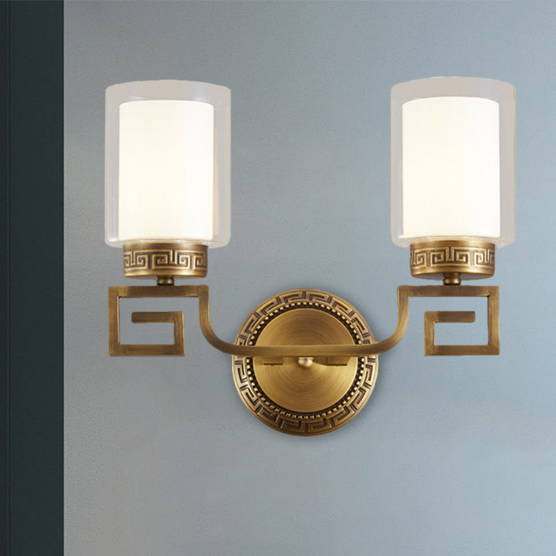 2 Bulbs Wall Sconce Light Traditional Dual Cylinder Clear and White Glass Wall Mount Lighting in Brass Clearhalo 'Wall Lamps & Sconces' 'Wall Lights' Lighting' 1580642