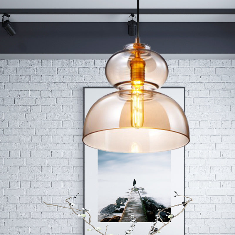 Contemporary Curved Ceiling Light Blue/Cognac Glass 1 Bulb Restaurant Pendant Lighting Fixture, 10"/11" Wide Cognac 10" Clearhalo 'Ceiling Lights' 'Close To Ceiling Lights' 'Glass shade' 'Glass' 'Modern Pendants' 'Modern' 'Pendant Lights' 'Pendants' Lighting' 1604851