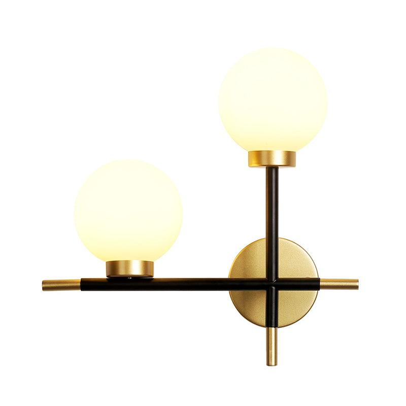 2-Bulb Milky Glass Sconce Light Fixture Modern Black Double Globe Living Room Wall Lamp with Cross Design Clearhalo 'Cast Iron' 'Glass' 'Industrial' 'Modern wall lights' 'Modern' 'Tiffany' 'Traditional wall lights' 'Wall Lamps & Sconces' 'Wall Lights' Lighting' 161511