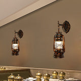 One Bulb Wall Light with Lantern Shade Clear Glass Coastal Bathroom Sconce in Antique Copper Clearhalo 'Art deco wall lights' 'Cast Iron' 'Glass' 'Industrial wall lights' 'Industrial' 'Middle century wall lights' 'Modern' 'Rustic wall lights' 'Tiffany' 'Traditional wall lights' 'Wall Lamps & Sconces' 'Wall Lights' Lighting' 161533