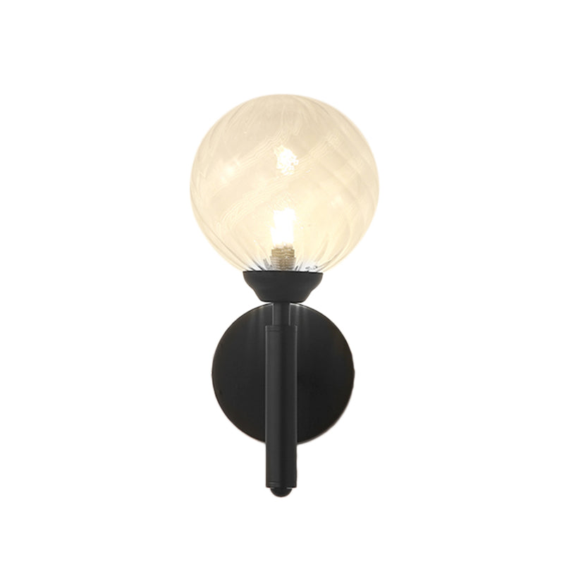 Clear Textured Glass Black Sconce Light Round 1-Light Modern Wall Lamp Fixture for Bedroom Clearhalo 'Art deco wall lights' 'Cast Iron' 'Glass' 'Industrial wall lights' 'Industrial' 'Middle century wall lights' 'Modern' 'Rustic wall lights' 'Tiffany' 'Traditional wall lights' 'Wall Lamps & Sconces' 'Wall Lights' Lighting' 161931
