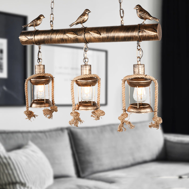 Coastal Lantern Island Pendant 3-Light Clear Glass Hanging Lamp Kit in Antique Brass with Bird Antique Brass Clearhalo 'Ceiling Lights' 'Island Lights' Lighting' 162844