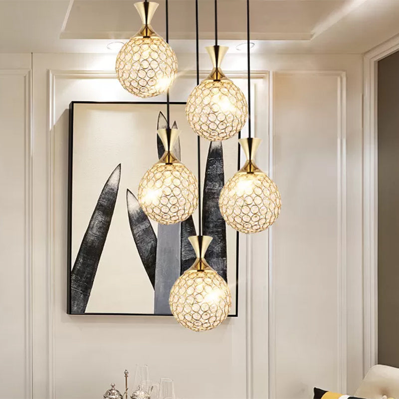 Globe Dinning Room Ceiling Lamp Minimal Crystal Encrusted 3/5 Bulbs Gold Multi Pendant Lighting Fixture 5 Gold Clearhalo 'Ceiling Lights' 'Modern Pendants' 'Modern' 'Pendant Lights' 'Pendants' Lighting' 1629094