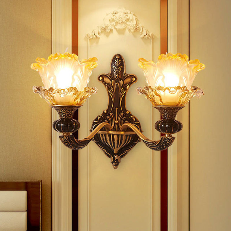 1/2-Head Wall Lamp Rural Curvy Metallic Wall Lighting Ideas in Brass with Flower Amber Glass Shade 2.0 Brass Clearhalo 'Wall Lamps & Sconces' 'Wall Lights' Lighting' 1688598