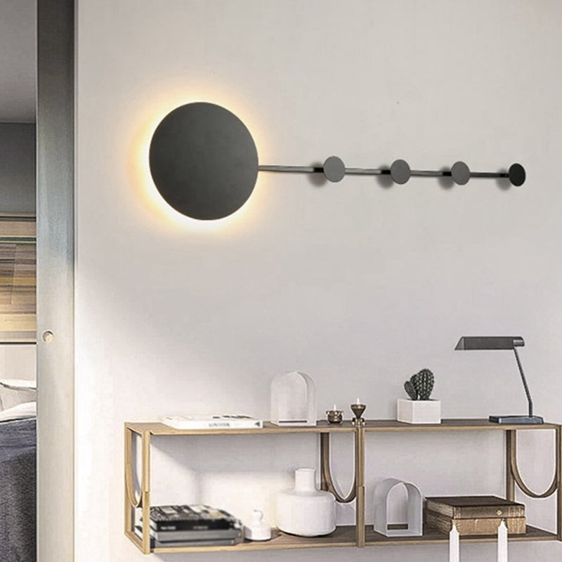 Circle Wall Mount Light Fixture Modernist Metal Black/White LED Wall Sconce with Hook Design in Warm/White Light Black Clearhalo 'Cast Iron' 'Glass' 'Industrial' 'Modern wall lights' 'Modern' 'Tiffany' 'Traditional wall lights' 'Wall Lamps & Sconces' 'Wall Lights' Lighting' 1710531