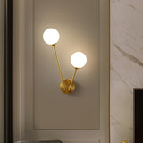 Opaline Glass Globe LED Wall Light Fixture Mid Century 2 Lights Wall Mount Lamp in Brass Clearhalo 'Cast Iron' 'Glass' 'Industrial' 'Modern wall lights' 'Modern' 'Tiffany' 'Traditional wall lights' 'Wall Lamps & Sconces' 'Wall Lights' Lighting' 1710573