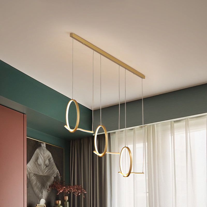 Metallic 3 Ringed Chandelier Lamp Modernist LED Hanging Light Kit in Black/Gold, Warm/White Light Gold Clearhalo 'Ceiling Lights' 'Modern Pendants' 'Modern' 'Pendant Lights' 'Pendants' Lighting' 1713750