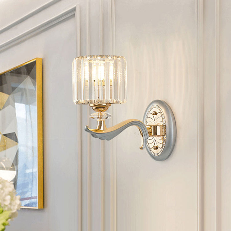 Modernist 1/2-Head Wall Light Fixture Gold Cylinder Wall Mounted Lamp with Clear Crystal Shade Clearhalo 'Modern wall lights' 'Modern' 'Wall Lamps & Sconces' 'Wall Lights' Lighting' 1771314