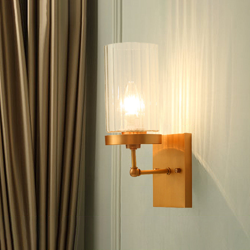 Clear Ribbed Glass Cylinder Wall Light 1/2-Head Bedroom Wall Sconce Lighting Fixture in Gold Clearhalo 'Wall Lamps & Sconces' 'Wall Lights' Lighting' 1787564