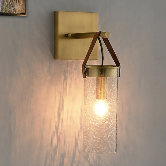 Postmodern Cylindrical Sconce Ideas Clear Crack Glass 1 Head Dining Room Wall Mounted Lamp in Brass with Leather Strap Brass Clearhalo 'Cast Iron' 'Glass' 'Industrial' 'Modern wall lights' 'Modern' 'Tiffany' 'Traditional wall lights' 'Wall Lamps & Sconces' 'Wall Lights' Lighting' 1788610
