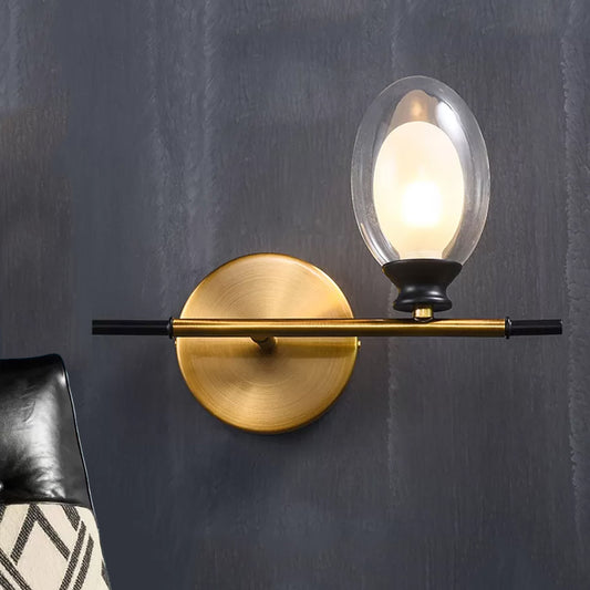 Brass Straight Rod Wall Lamp Mid Century 1 Head Metal Sconce Ideas with Dual Oval Clear/Amber Glass Shade Clear Clearhalo 'Cast Iron' 'Glass' 'Industrial' 'Modern wall lights' 'Modern' 'Tiffany' 'Traditional wall lights' 'Wall Lamps & Sconces' 'Wall Lights' Lighting' 1789123