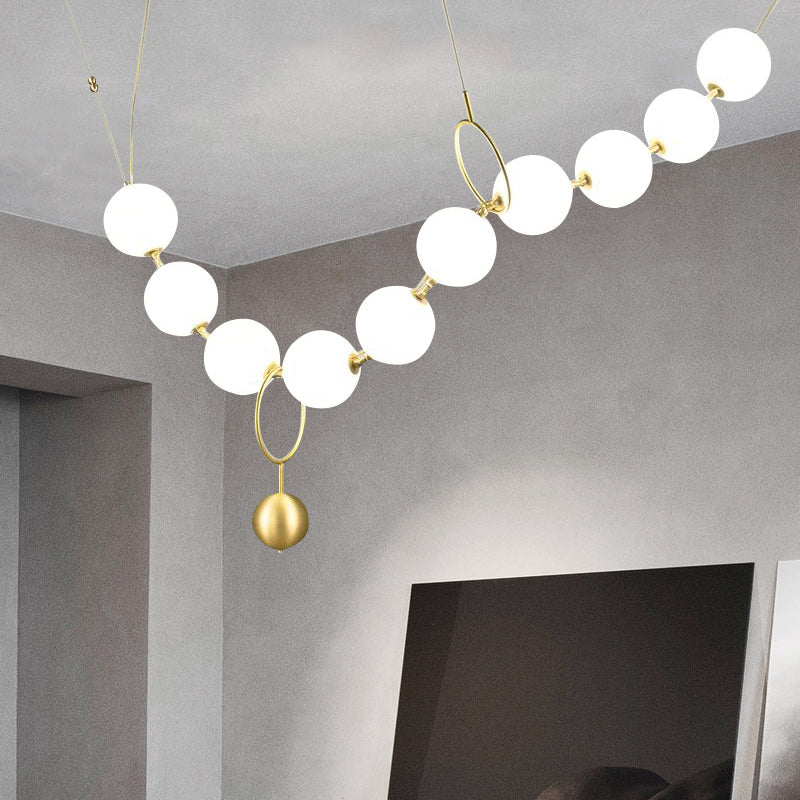 Necklace-Shape Dining Table Chandelier Milk Glass 10 Lights Simple Hanging Light in Gold Clearhalo 'Ceiling Lights' 'Chandeliers' 'Glass shade' 'Glass' 'Modern Chandeliers' 'Modern' Lighting' 1791132