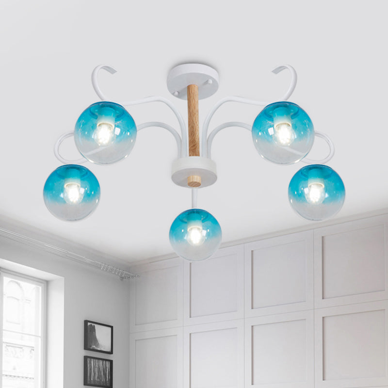 Living Room Twist Arm Chandelier with Orbit Shade Clear Glass Romantic Blue Pendant Light 5 Blue Clearhalo 'Ceiling Lights' 'Chandeliers' 'Glass shade' 'Glass' 'Modern Chandeliers' 'Modern' Lighting' 1791167