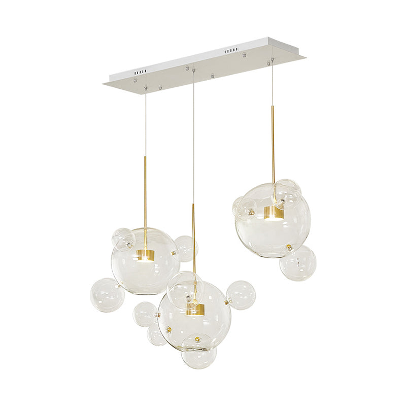 Modernist 3 Lights Down Lighting White Molecule-Shape Multi Pendant with Clear Glass Shade Clearhalo 'Ceiling Lights' 'Close To Ceiling Lights' 'Glass shade' 'Glass' 'Modern Pendants' 'Modern' 'Pendant Lights' 'Pendants' Lighting' 1804447