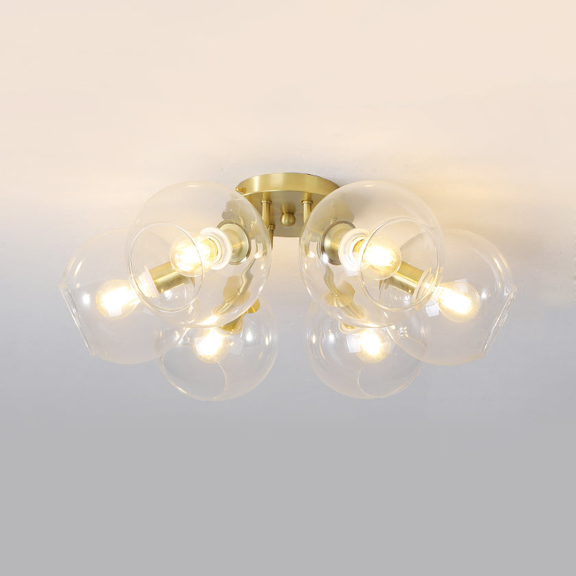 Clear Glass Sphere Semi Flush Lighting Modern 6 Lights Led Semi Flush Mount Lamp Fixture in Gold Clearhalo 'Ceiling Lights' 'Close To Ceiling Lights' 'Close to ceiling' 'Glass shade' 'Glass' 'Semi-flushmount' Lighting' 182869