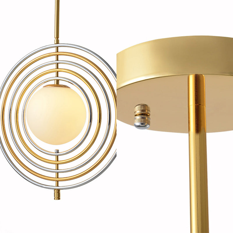 Frosted Glass Orbit Pendant Light with Concentric Ring Dining Room 1 Light Modern Hanging Light in Gold Clearhalo 'Ceiling Lights' 'Modern Pendants' 'Modern' 'Pendant Lights' 'Pendants' Lighting' 185667