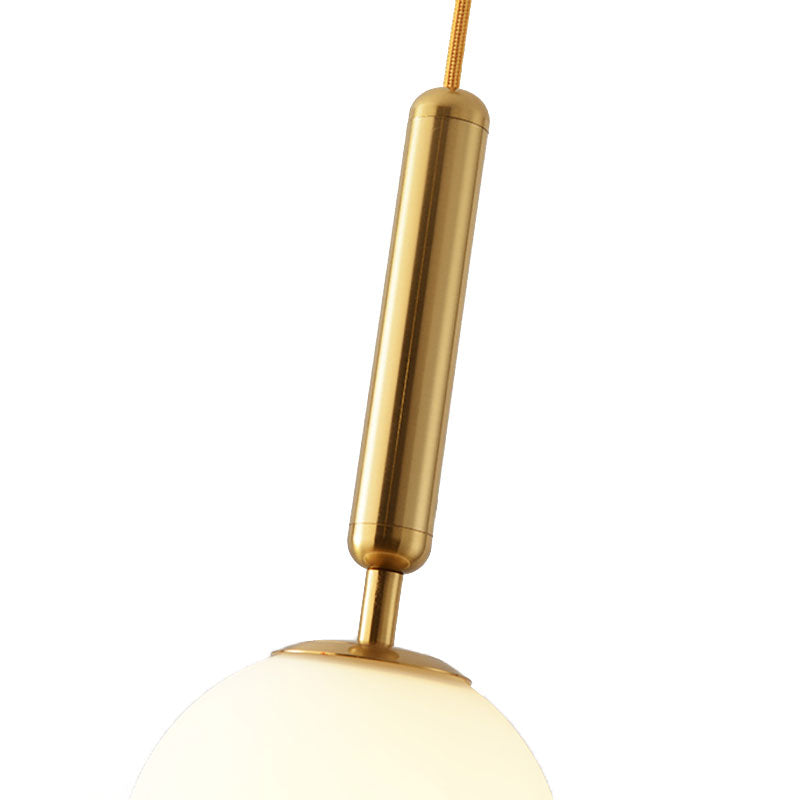 Spherical White Glass Suspension Pendant Modernist 1 Light 6"/8"/10" Wide Black/Gold Hanging Light Fixture Clearhalo 'Ceiling Lights' 'Glass shade' 'Glass' 'Island Lights' 'Modern Pendants' 'Modern' 'Pendant Lights' 'Pendants' Lighting' 186689