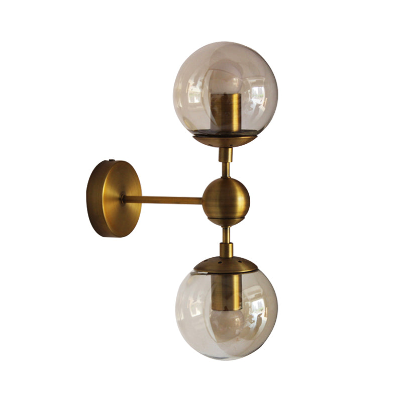 Globe Shaped Wall Sconce Post Modern Amber Glass 1/2 Light Brass Wall Mount Lighting Clearhalo 'Cast Iron' 'Glass' 'Industrial' 'Modern wall lights' 'Modern' 'Tiffany' 'Traditional wall lights' 'Wall Lamps & Sconces' 'Wall Lights' Lighting' 186760