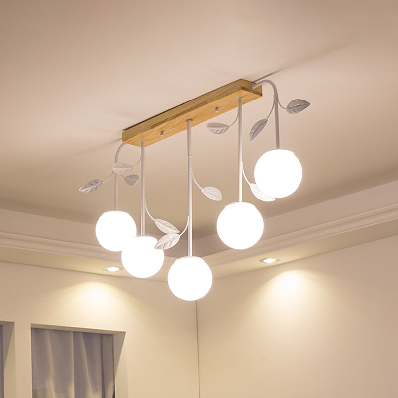 3/5 Lights Orb Island Light Modern Simple Milky Glass Ceiling Lamp with Wooden Canopy 5 Wood Clearhalo 'Ceiling Lights' 'Island Lights' Lighting' 1872675